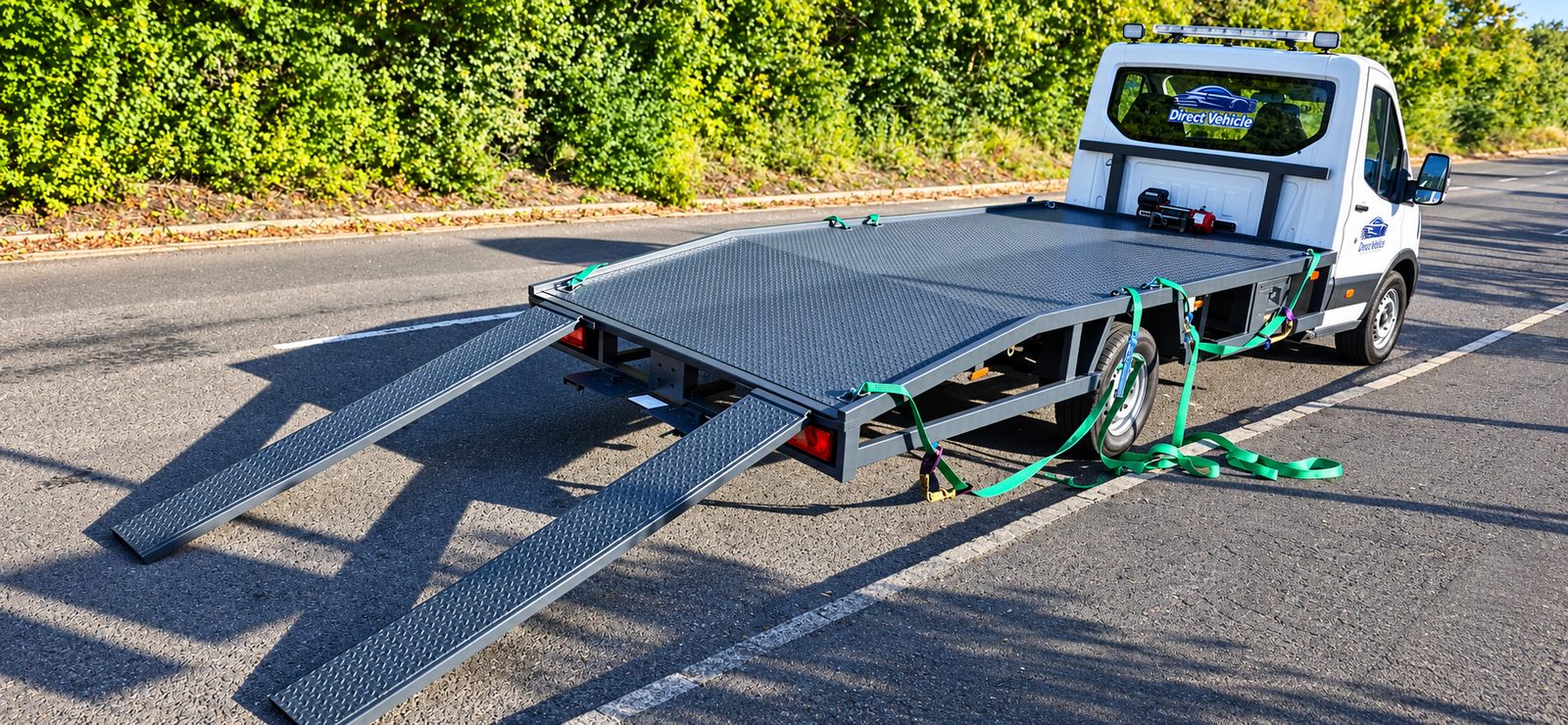 Transporter with loading ramps down, ready to collect